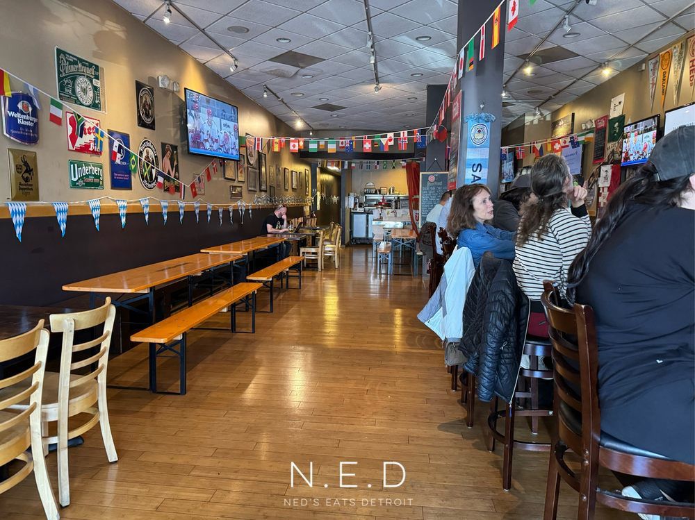 Bavarian-style wooden benches and communal tables at Steins