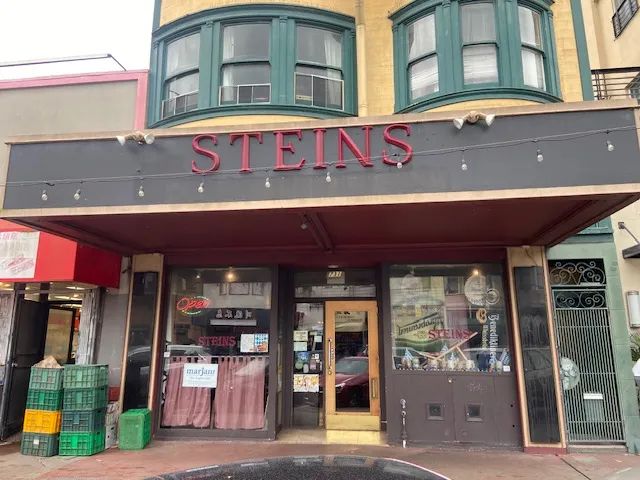 Steins restaurant storefront on Clement Street — brick exterior, warm lighting, and the iconic Steins sign at 731 Clement St, San Francisco